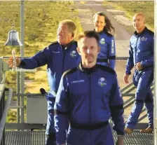  ?? Reuters ?? Star Trek actor William Shatner rings a bell before boarding ■
Blue Origin’s New Shepard rocket for the suborbital flight.