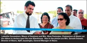  ??  ?? Lalantha Gunasekara, Mayor of Seeduwa and Mrs. Aban Pestonjee, Chairperso­n of Abans cut the ribbon to declare open the new Warehouse. Also in the picture are Mrs. Saroshi Dubash, Director of Abans, Ajith Jayasinghe, General Manager of Abans