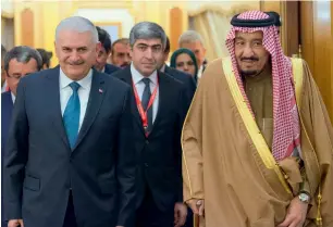  ?? AFP ?? Turkish Prime Minister Binali Yildirim with Saudi King Salman in Riyadh on Wednesday. —