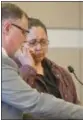  ?? ERIC BONZAR—THE MORNING JOURNAL ?? Standing alongside Assistant County Prosecutor Peter Gauthier, Linda Marie Velez’ sisterin-law Elsie Velez wipes away tears as she reads a statement on behalf of the Velez family, Feb. 27.