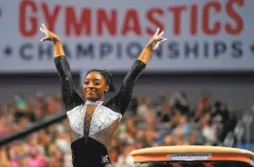  ?? Tony Gutierrez / Associated Press ?? Simone Biles, shown in June at the U.S. Gymnastics Championsh­ips in Fort Worth, Texas, pulled out of the Olympics finals, citing mental health concerns.