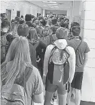  ??  ?? Students fill the hall at North Paulding High School in Dallas, Ga., on Tuesday. AP