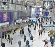 ??  ?? Commuters walk through a quiet Waterloo Station in London on Tuesday morning.
AFP