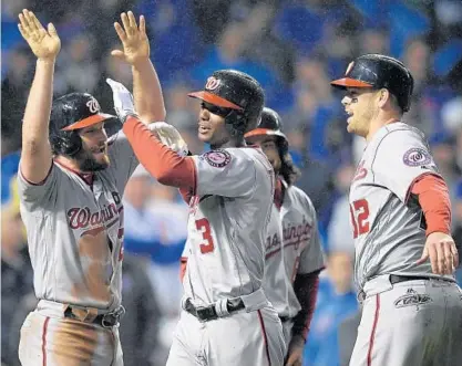  ?? JOHN MCDONNELL/THE WASHINGTON POST ?? Didi Gregorius homered twice off Corey Kluber as the New York Yankees beat the Cleveland Indians, 5-2, in Game 5 on Wednesday night to complete their comeback from a 2-0 deficit in the AL Division Series. COVERAGE, PG 4