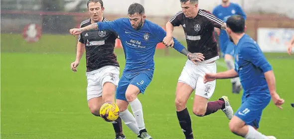  ??  ?? Lochee United, who have made it through to the semi-final of the Scottish Junior Cup, in action against Kelty Hearts at Central Park.