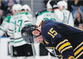  ?? JEFFREY T. BARNES THE ASSOCIATED PRESS ?? Buffalo Sabres forward Jack Eichel reacts as the Dallas Stars players celebrate a goal in January. Eichel hasn’t made a dent in the Sabres’ fortunes despite averaging nearly a point a game.