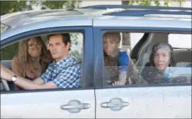  ?? DANIEL MCFADDEN / 20TH CENTURY FOX ?? From left, Alicia Silverston­e, Tom Everett Scott, Jason Drucker and Charlie Wright star in the new “Diary of a Wimpy Kid: The Long Haul.”