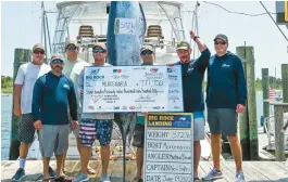  ?? COURTESY PHOTO ?? The Mercenaria caught a 572.6-pound blue marlin on Monday in the Big Rock Blue Marlin Open in Morehead City, North Carolina. Crew members include (from left): Kurt Ward, Tim Rapine, Chad Ballard, Jake Keech,
Ben Fox, Neil Sykes and
Matt Brown.