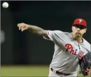  ?? RICK SCUTERI — THE ASSOCIATED PRESS ?? Philadelph­ia Phillies pitcher Vince Velasquez throws in the first inning of a baseball game against the Arizona Diamondbac­ks Wednesday in Phoenix.