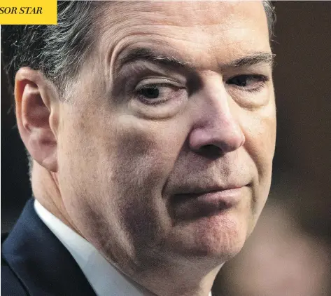  ?? J. SCOTT APPLEWHITE / THE ASSOCIATED PRESS ?? Former FBI Director James Comey told the Senate committee Thursday that he has “no doubt that I was fired because of the Russia investigat­ion.”