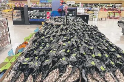  ?? NAM Y. HUH/AP FILE ?? Bags of pistachios at a grocery store in northwest suburban Mount Prospect. Illinois’ 1% sales tax on groceries will be suspended through June 30, 2023.
