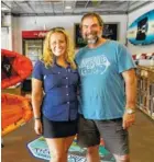  ??  ?? Owners Charlie, right, and Renee Eich pose for a portrait in the River Drifters Bar &amp; Grill.