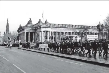  ??  ?? 01_B05twe05 More than 20 Arran farmers joined a mass rally in Edinburgh in protest at rules that are increasing­ly making farming in Scotland no longer viable. The protests started at the Edinburgh Playhouse and continued along Princes Street.