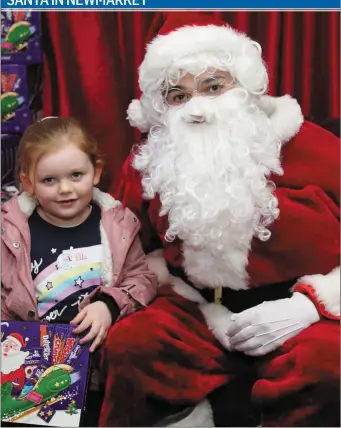  ??  ?? Ella Heffernan met Santa at the launch of Christmas in Newmarket. Photo by Sheila Fitzgerald.