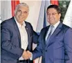  ?? | AFP ?? ISRAEL’S Foreign Minister Yair Lapid, left, and Morocco’s Foreign Minister Nasser Bourita met on Sunday.