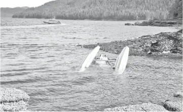  ?? — Reuters photo ?? US Coast Guard crew searches for survivors from the downed aircraft in the vicinity of George Inlet near Ketchikan, Alaska, US.