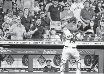  ?? Karen Warren / Staff photograph­er ?? The American League West-leading Astros are allowed to pack Minute Maid Park, a sign of progress, daily momentum and hope as the world tries to navigate the coronaviru­s pandemic.