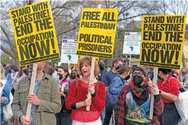  ?? AP PHOTO/JOSE LUIS MAGANA ?? Protesters demonstrat­e March 30 in support of Palestinia­ns at Dupont Circle in Washington.