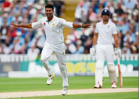  ??  ?? Happy man: Pakistan’s Sohail Khan (left) celebrates during the first day of the third Test against England at Edgbaston on Wednesday. — Reuters