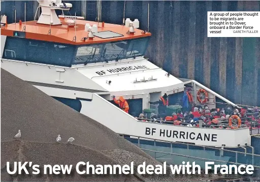  ?? A group of people thought to be migrants are brought in to Dover, onboard a Border Force vessel GARETH FULLER ??