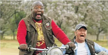  ?? Picture: SUPPLIED ?? HERE COMES TROUBLE: Kenneth Nkosi and Leon Schuster in one of the scenes from ‘Mad Buddies’, a local film which opens in cinemas nationwide today