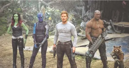  ?? DISNEY-MARVEL ?? From left are Zoe Saldana, Karen Gillan, Chris Pratt, Dave Bautista and Rocket, voiced by Bradley Cooper, in a scene from “Guardians Of The Galaxy Vol. 2.”