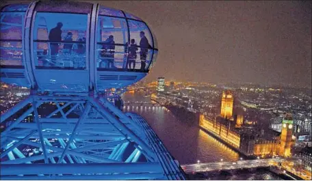  ?? Christophe­r Reynolds Los Angeles Times ?? NEARLY 80 million Americans went abroad in the first 11 months of last year. Above, the London Eye observator­y and a view of Big Ben.