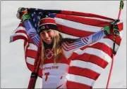  ?? Morry Gash / AP ?? Mikaela Shiffrin celebrates after winning her gold medal.