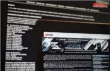  ?? RAPHAEL SATTER — THE ASSOCIATED PRESS ?? Archived versions of two Russian anti-terrorism websites on a computer screen are photograph­ed, in Paris. The nowdefunct websites were the brainchild of alleged hacker Pyotr Levashov, according to Andrei Soldatov, an expert on the Russian security...