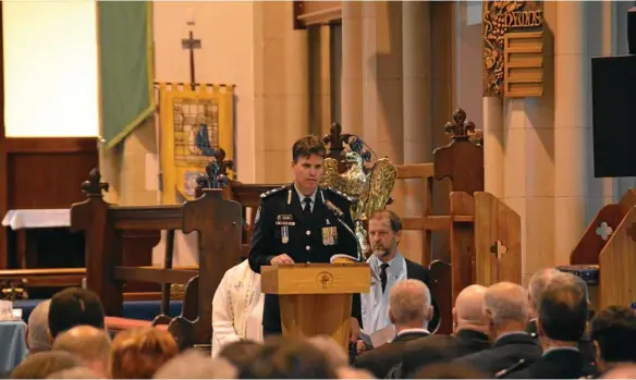  ?? PHOTOS: TARA MIKO ?? FALLEN, NOT FORGOTTEN: Superinten­dent Mark Kelly gives the commission­er’s address at National Police Remembranc­e Day.