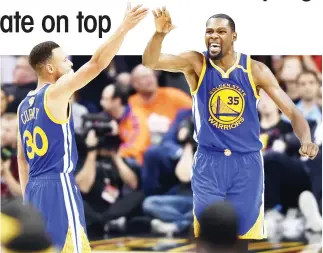  ??  ?? Golden State Warriors guard Stephen Curry (30) and forward Kevin Durant. (USA TODAY Sports)