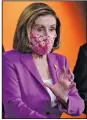  ?? (AP/J. Scott Applewhite) ?? “I’m so excited, I just can’t hide it,” House Speaker Nancy Pelosi said Tuesday about the prospect of getting the virus relief bill passed and sent to the White House.