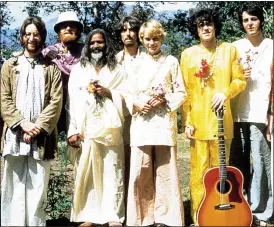 ??  ?? MAGICAL HISTORY TOUR: Donovan, second right, in India in 1968 with John Lennon, left, Paul McCartney, right, and the Maharishi Mahesh Yogi