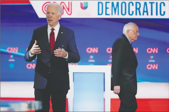  ??  ?? Former Vice President Joe Biden prepares March 15 for a Democratic presidenti­al primary debate with Sen. Bernie Sanders, I-Vt., at CNN Studios in Washington. (File Photo/AP/Evan Vucci)