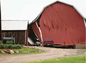  ?? George Hubka / MG News via Associated Press ?? Authoritie­s say severe thundersto­rms in western portions of Texas, most of Oklahoma and southern Kansas spawned a few tornadoes, damaging barns and knocking down trees.