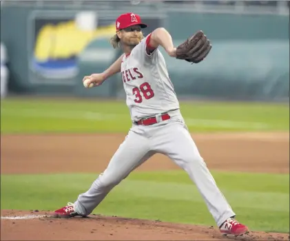  ?? PHOTOS BY ORLIN WAGNER ?? Angels starting pitcher Alex Cobb retired 12 of 14 Kansas City batters in the first five innings on Monday night at Kauffman Stadium.