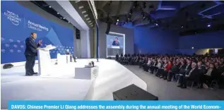  ?? — AFP ?? DAVOS: Chinese Premier Li Qiang addresses the assembly during the annual meeting of the World Economic Forum (WEF) in Davos on January 16, 2024.