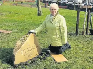  ??  ?? Mr Broadley’s widow Jean with the commemorat­ive stone in Gatty Park