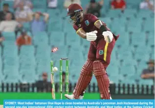  ?? ?? SYDNEY: West Indies’ batsman Shai Hope is clean bowled by Australia’s paceman Josh Hazlewood during the second one-day internatio­nal (ODI) cricket match between Australia and West Indies at the Sydney Cricket Ground in Sydney on February 4, 2024. — AFP