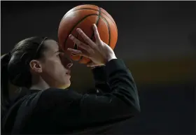  ?? ABBIE PARR — THE ASSOCIATED PRESS ?? Iowa guard Caitlin Clark warms up before Wednesday’s game at Minnesota in Minneapoli­s.