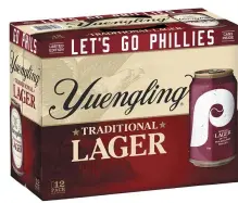  ?? COURTESY OF D.G. YUENGLING & SON ?? Pottsville-based Yuengling will feature its Lager beer with cans decorated with the retro Philadelph­ia Phillies logo.