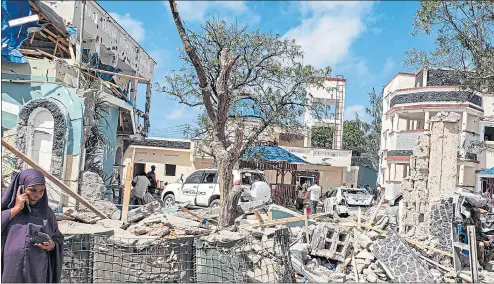  ??  ?? The rubble of the Asasey Hotel in Kismayo, Somalia