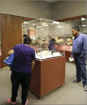  ??  ?? ABOVE LEFT: The new mini exhibit case will be on display throughout the fall in the Visible Storage exhibit where regional ceramics are on display at the Imperial Valley Desert Museum.