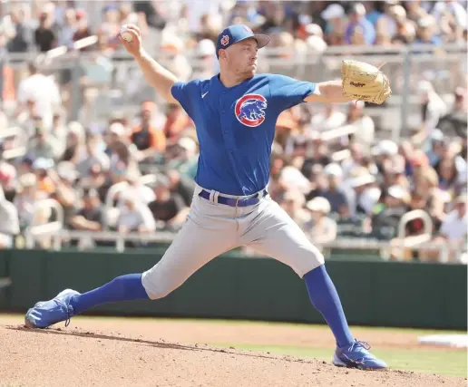  ?? JOHN ANTONOFF/SUN-TIMES ?? Cubs right-hander Adrian Sampson allowed two runs (one earned) and two hits and struck out six in 4„ innings Saturday against the Giants.