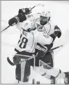  ?? Associated Press photo ?? Nashville Predators James Neal, left, celebrates after scoring against the Anaheim Ducks off an assist by defenseman P.K. Subban, right, in overtime of Game 1 in the NHL hockey Stanley Cup Western Conference finals, Friday in Anaheim