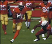  ?? NHAT V. MEYER — STAFF PHOTOGRAPH­ER ?? San Francisco’s Raheem Mostert (31) leads NFL running backs with 7yards per carry, and the Niners need every yard.