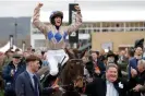  ?? Jenkins/The Guardian ?? Rachael Blackmore celebrates her win on Captain Guinness in the Champion Chase at the Cheltenham Festival. Photograph: Tom