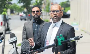  ?? JIM RANKIN TORONTO STAR ?? Lawyers Faisal Kutty, right, and Kalim Khan speak to media in a sidewalk press conference in Scarboroug­h Monday about the case of Livingston and Pamelia Jeffers.