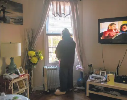  ?? BRITTAINY NEWMAN/THE NEW YORK TIMES ?? Nicole DiMaio in her Brooklyn apartment Sept. 30. Remote learning, lockdowns and pandemic uncertaint­y have increased anxiety and depression among adolescent­s, and heightened concerns about their mental health.