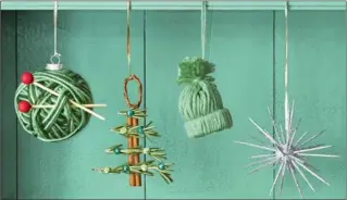  ?? ERIKA LAPRESTO, WOMAN’S DAY VIA AP ?? Ornaments made using simple items around the house, such as toothpicks, yarn and cinnamon sticks.